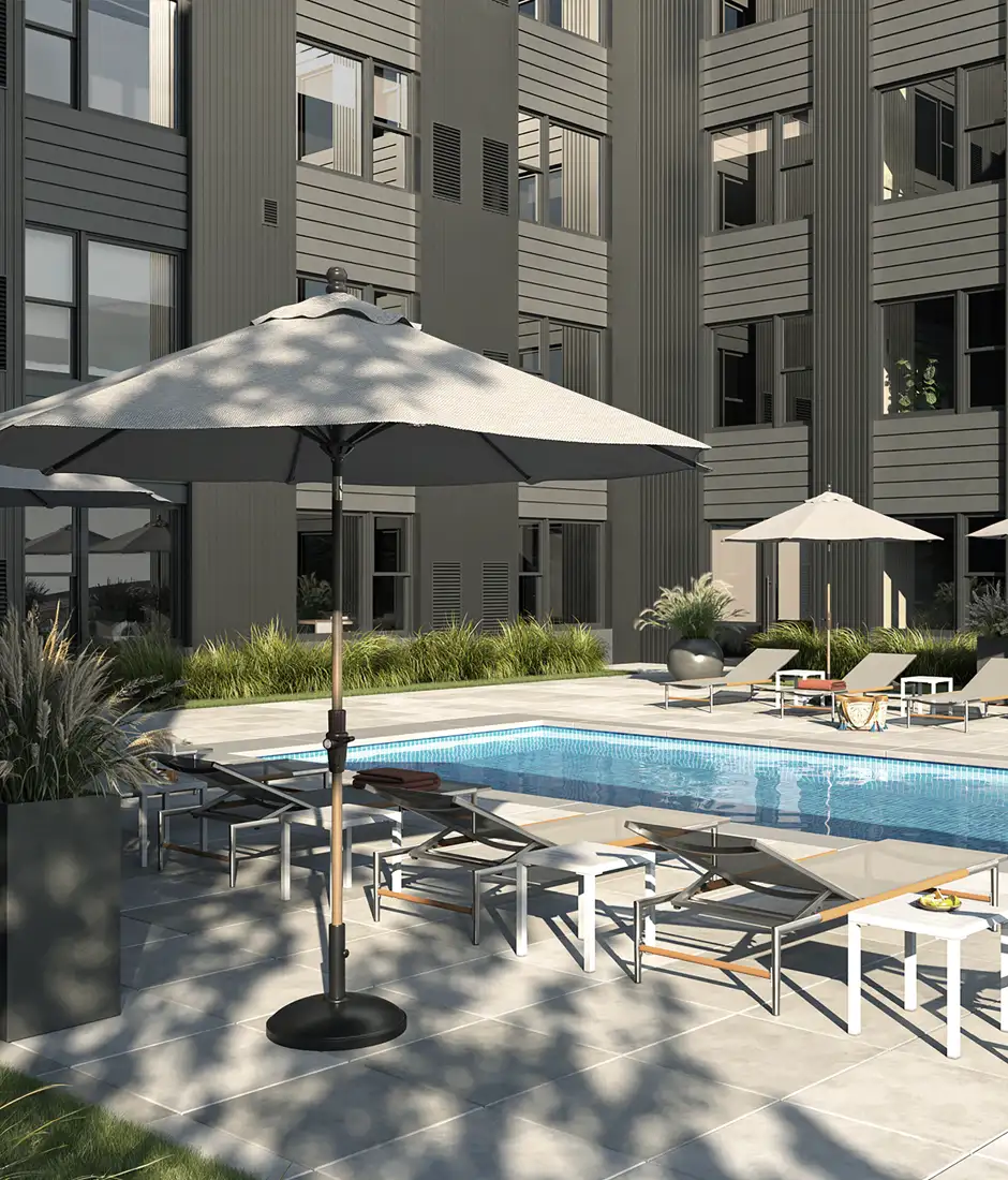 The Mercer | Outdoor Pool | A resort-style outdoor pool designed for warm-weather lounging and socializing.